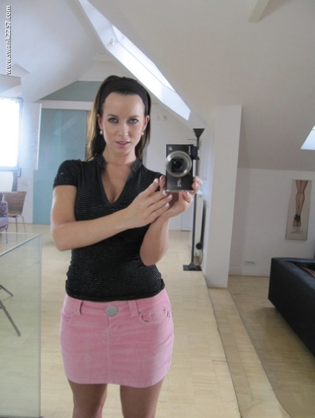Stunning babe Cindy Dollar uncovering her big tits and sexy ass